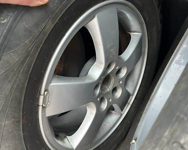 Черный Хендай Туксон, объемом двигателя 2 л и пробегом 136 тыс. км за 8500 $, фото 32 на Automoto.ua