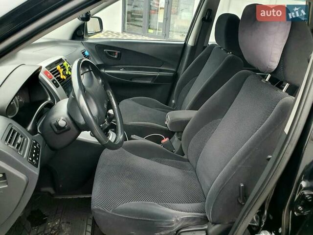 Чорний Хендай Туксон, об'ємом двигуна 2 л та пробігом 225 тис. км за 8000 $, фото 40 на Automoto.ua