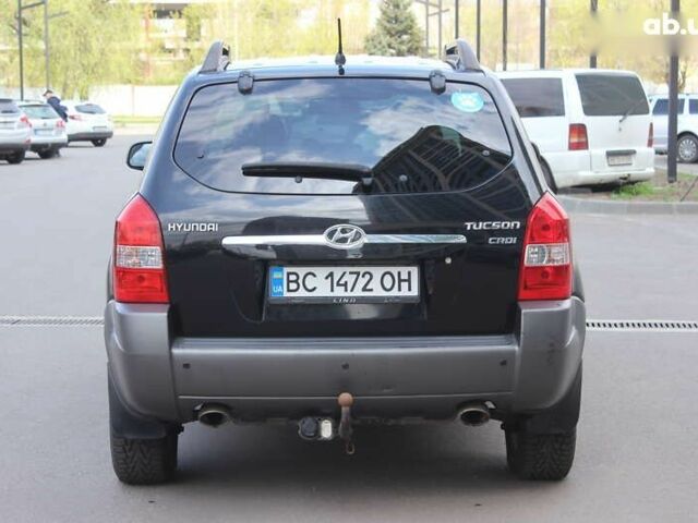 Черный Хендай Туксон, объемом двигателя 2 л и пробегом 210 тыс. км за 8999 $, фото 6 на Automoto.ua