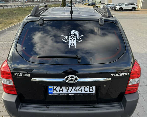 Чорний Хендай Туксон, об'ємом двигуна 1.98 л та пробігом 318 тис. км за 7399 $, фото 8 на Automoto.ua