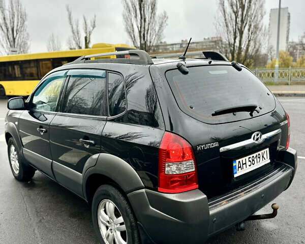 Чорний Хендай Туксон, об'ємом двигуна 1.98 л та пробігом 238 тис. км за 8499 $, фото 12 на Automoto.ua