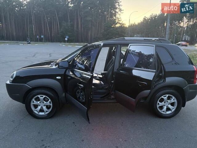 Чорний Хендай Туксон, об'ємом двигуна 1.98 л та пробігом 273 тис. км за 10000 $, фото 20 на Automoto.ua