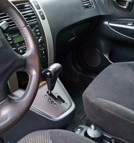 Черный Хендай Туксон, объемом двигателя 1.98 л и пробегом 200 тыс. км за 6600 $, фото 7 на Automoto.ua