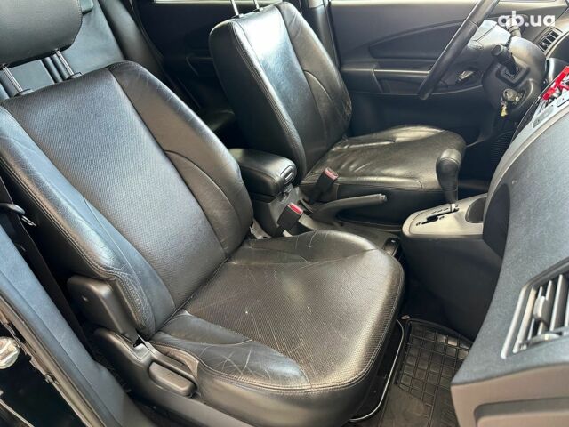 Хендай Туксон 2008 в Одессе на Automoto.ua Черный Хендай Туксон, объемом двигателя 2.7 л и пробегом 158 тыс. км за 7940 $, фото 16 на Automoto.ua