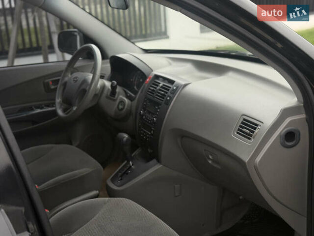 Чорний Хендай Туксон, об'ємом двигуна 2 л та пробігом 107 тис. км за 8500 $, фото 14 на Automoto.ua