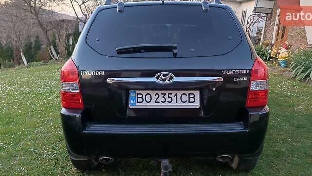 Черный Хендай Туксон, объемом двигателя 1.99 л и пробегом 203 тыс. км за 8000 $, фото 3 на Automoto.ua