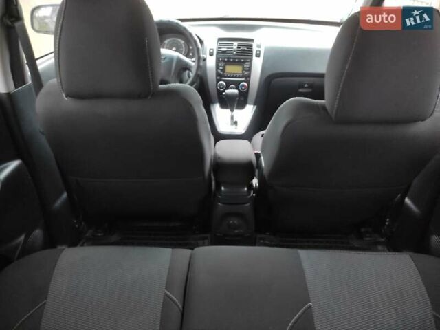 Черный Хендай Туксон, объемом двигателя 2 л и пробегом 237 тыс. км за 7500 $, фото 10 на Automoto.ua
