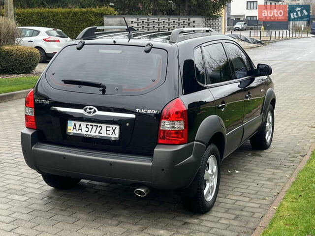 Черный Хендай Туксон, объемом двигателя 2 л и пробегом 107 тыс. км за 8900 $, фото 9 на Automoto.ua