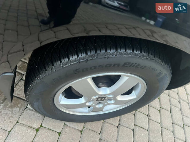 Черный Хендай Туксон, объемом двигателя 2 л и пробегом 276 тыс. км за 7450 $, фото 19 на Automoto.ua