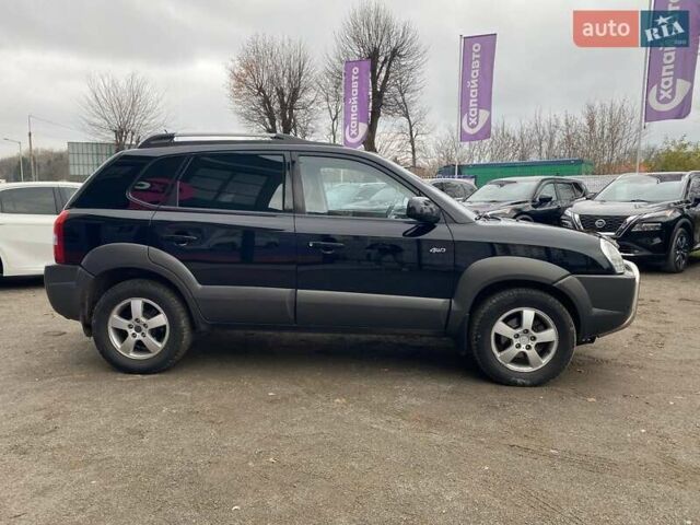 Чорний Хендай Туксон, об'ємом двигуна 1.98 л та пробігом 176 тис. км за 8500 $, фото 3 на Automoto.ua