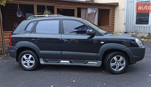 Хендай Туксон 2008 у Харкові на Automoto.ua Чорний Хендай Туксон, об'ємом двигуна 1.99 л та пробігом 188 тис. км за 8800 $, фото 3 на Automoto.ua