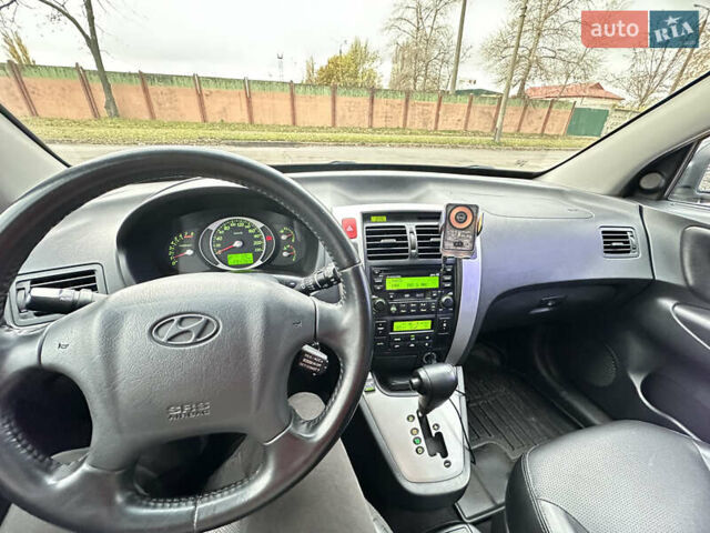 Чорний Хендай Туксон, об'ємом двигуна 2.66 л та пробігом 395 тис. км за 9950 $, фото 17 на Automoto.ua