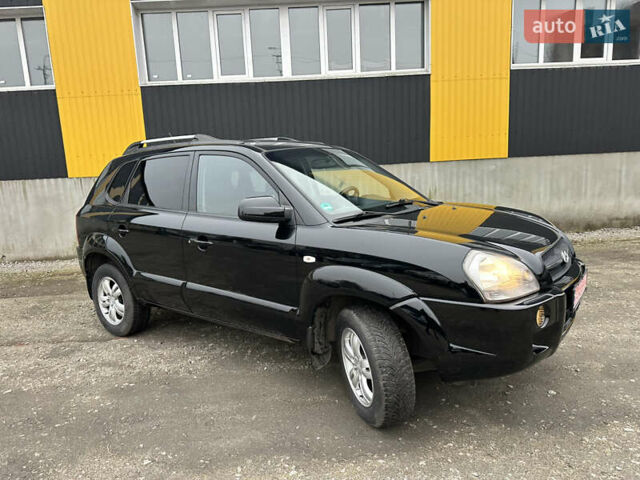 Чорний Хендай Туксон, об'ємом двигуна 2 л та пробігом 243 тис. км за 7999 $, фото 24 на Automoto.ua