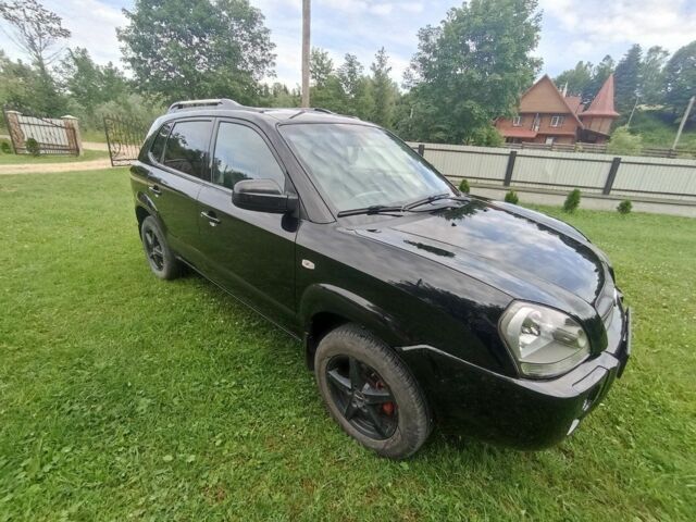 Черный Хендай Туксон, объемом двигателя 2 л и пробегом 220 тыс. км за 8200 $, фото 6 на Automoto.ua