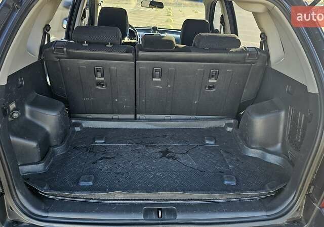 Чорний Хендай Туксон, об'ємом двигуна 1.98 л та пробігом 212 тис. км за 7766 $, фото 11 на Automoto.ua
