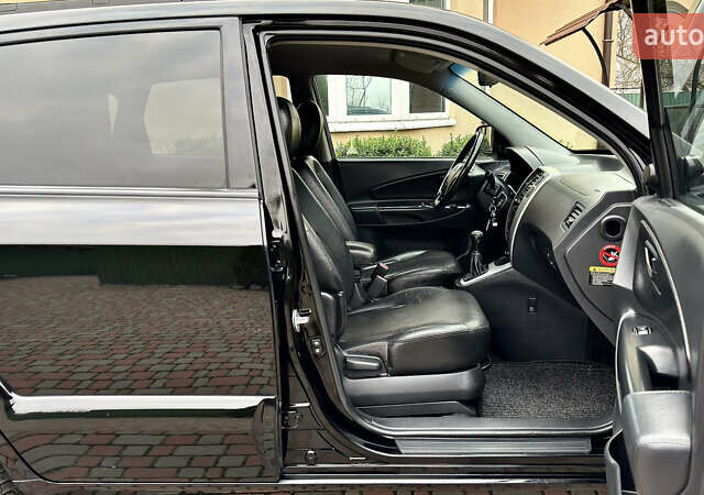 Чорний Хендай Туксон, об'ємом двигуна 2 л та пробігом 182 тис. км за 8299 $, фото 51 на Automoto.ua