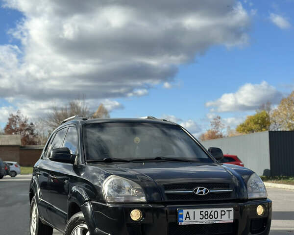 Черный Хендай Туксон, объемом двигателя 2 л и пробегом 300 тыс. км за 8300 $, фото 5 на Automoto.ua