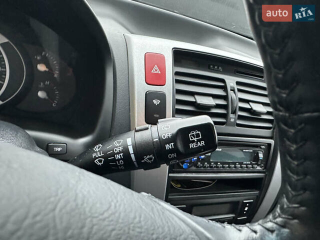 Чорний Хендай Туксон, об'ємом двигуна 2 л та пробігом 243 тис. км за 7999 $, фото 39 на Automoto.ua