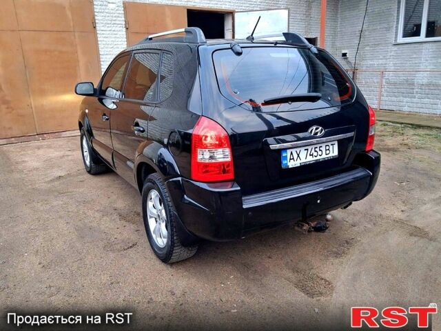 Чорний Хендай Туксон, об'ємом двигуна 2 л та пробігом 208 тис. км за 7500 $, фото 10 на Automoto.ua
