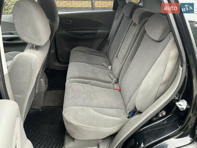 Черный Хендай Туксон, объемом двигателя 2 л и пробегом 107 тыс. км за 8900 $, фото 27 на Automoto.ua