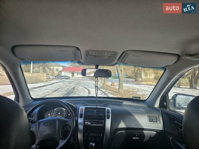 Чорний Хендай Туксон, об'ємом двигуна 2 л та пробігом 199 тис. км за 8500 $, фото 20 на Automoto.ua