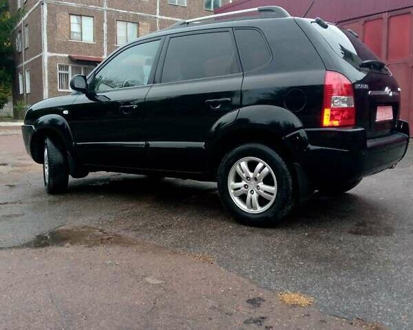 Чорний Хендай Туксон, об'ємом двигуна 2 л та пробігом 225 тис. км за 7850 $, фото 7 на Automoto.ua