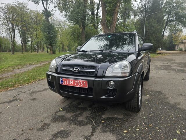 Чорний Хендай Туксон, об'ємом двигуна 2 л та пробігом 186 тис. км за 8300 $, фото 1 на Automoto.ua