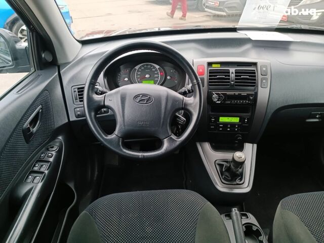 Чорний Хендай Туксон, об'ємом двигуна 2 л та пробігом 192 тис. км за 7990 $, фото 14 на Automoto.ua