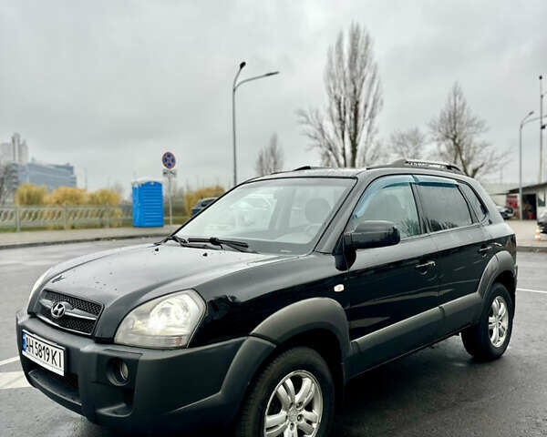 Чорний Хендай Туксон, об'ємом двигуна 1.98 л та пробігом 238 тис. км за 8499 $, фото 7 на Automoto.ua