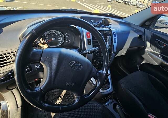 Чорний Хендай Туксон, об'ємом двигуна 1.98 л та пробігом 212 тис. км за 7766 $, фото 13 на Automoto.ua