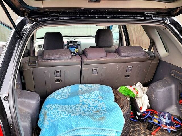 Черный Хендай Туксон, объемом двигателя 2 л и пробегом 223 тыс. км за 7500 $, фото 5 на Automoto.ua