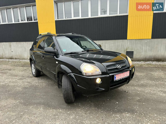 Чорний Хендай Туксон, об'ємом двигуна 2 л та пробігом 243 тис. км за 7999 $, фото 26 на Automoto.ua