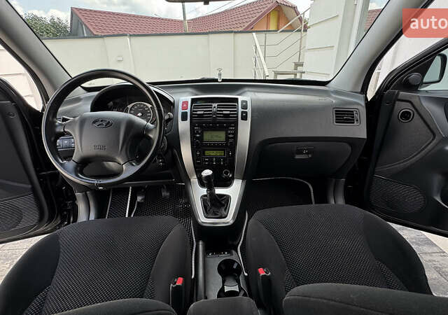 Черный Хендай Туксон, объемом двигателя 2 л и пробегом 67 тыс. км за 9999 $, фото 33 на Automoto.ua