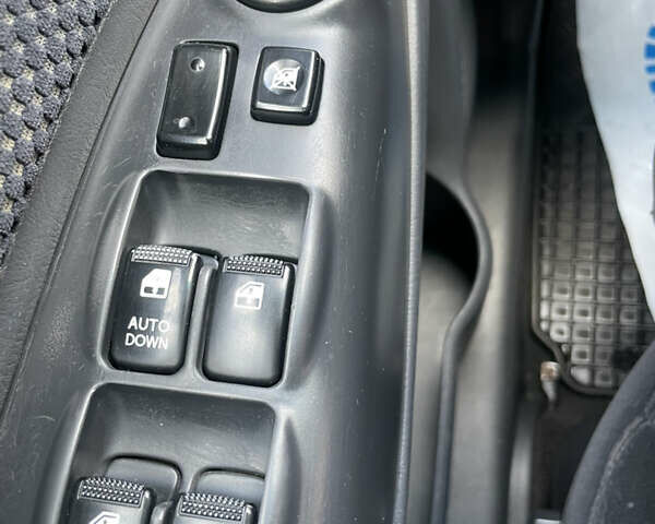 Черный Хендай Туксон, объемом двигателя 1.98 л и пробегом 177 тыс. км за 7600 $, фото 26 на Automoto.ua