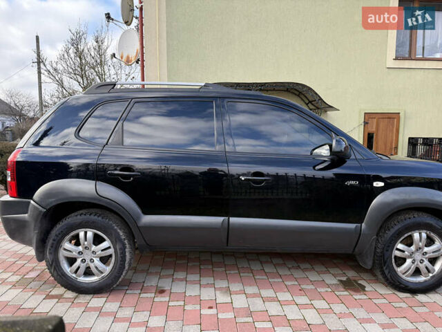Чорний Хендай Туксон, об'ємом двигуна 2 л та пробігом 314 тис. км за 7000 $, фото 16 на Automoto.ua