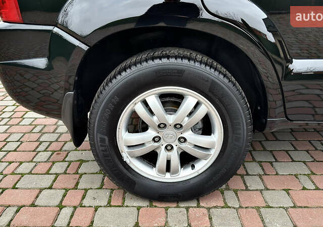 Чорний Хендай Туксон, об'ємом двигуна 2 л та пробігом 182 тис. км за 8299 $, фото 86 на Automoto.ua