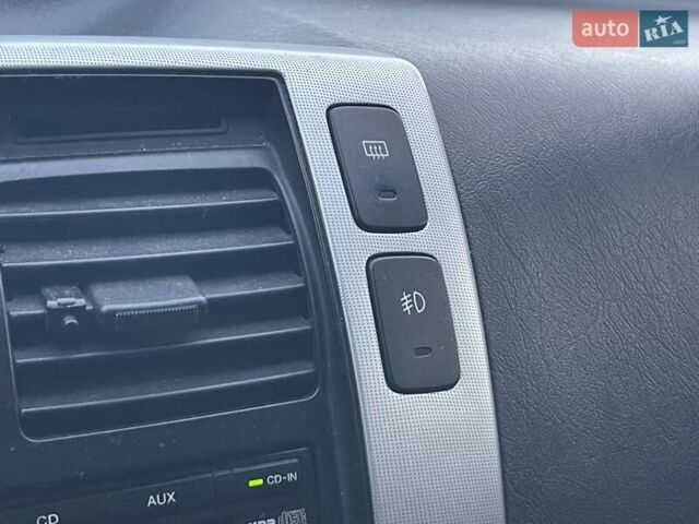 Хендай Туксон 2008 у Києві на Automoto.ua Чорний Хендай Туксон, об'ємом двигуна 2 л та пробігом 110 тис. км за 8750 $, фото 22 на Automoto.ua