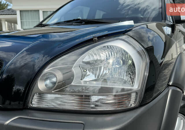 Черный Хендай Туксон, объемом двигателя 2 л и пробегом 67 тыс. км за 9999 $, фото 2 на Automoto.ua