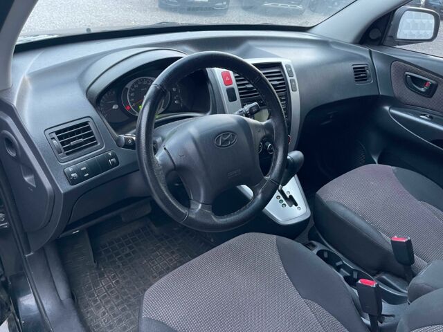 Чорний Хендай Туксон, об'ємом двигуна 2 л та пробігом 110 тис. км за 8750 $, фото 14 на Automoto.ua