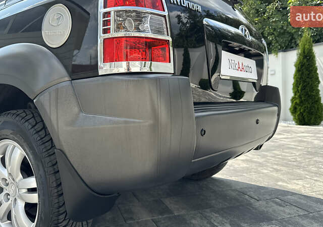 Черный Хендай Туксон, объемом двигателя 2 л и пробегом 67 тыс. км за 9999 $, фото 18 на Automoto.ua