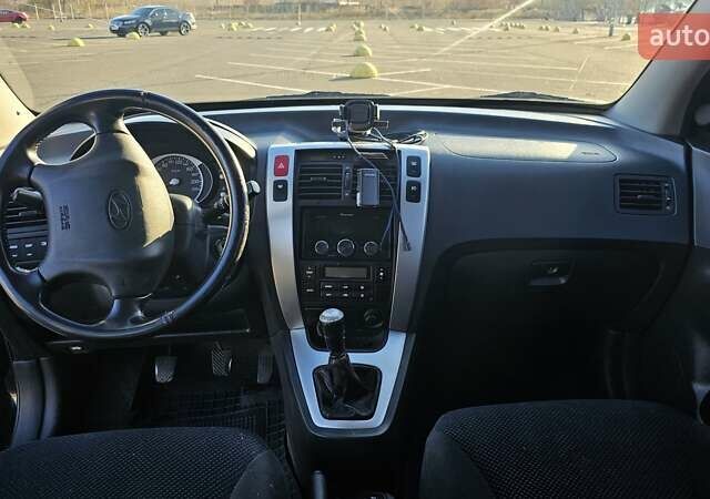 Чорний Хендай Туксон, об'ємом двигуна 1.98 л та пробігом 212 тис. км за 7766 $, фото 9 на Automoto.ua