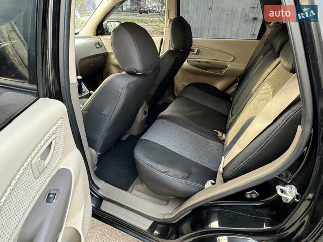 Черный Хендай Туксон, объемом двигателя 1.98 л и пробегом 196 тыс. км за 7999 $, фото 18 на Automoto.ua