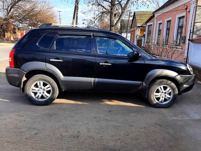 Черный Хендай Туксон, объемом двигателя 20 л и пробегом 195 тыс. км за 7999 $, фото 4 на Automoto.ua