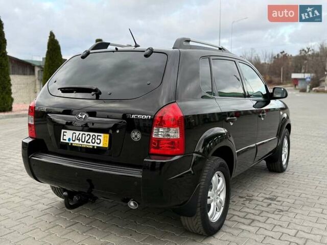 Черный Хендай Туксон, объемом двигателя 1.98 л и пробегом 239 тыс. км за 8700 $, фото 5 на Automoto.ua