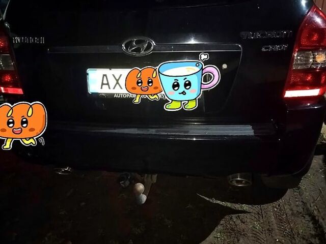 Чорний Хендай Туксон, об'ємом двигуна 2 л та пробігом 226 тис. км за 4720 $, фото 1 на Automoto.ua