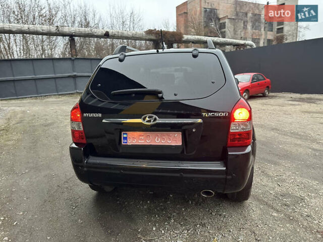 Чорний Хендай Туксон, об'ємом двигуна 2 л та пробігом 243 тис. км за 7999 $, фото 16 на Automoto.ua