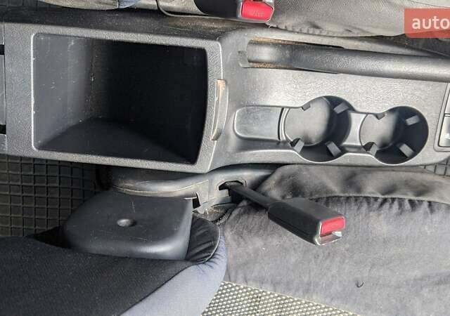 Черный Хендай Туксон, объемом двигателя 2 л и пробегом 163 тыс. км за 8100 $, фото 24 на Automoto.ua