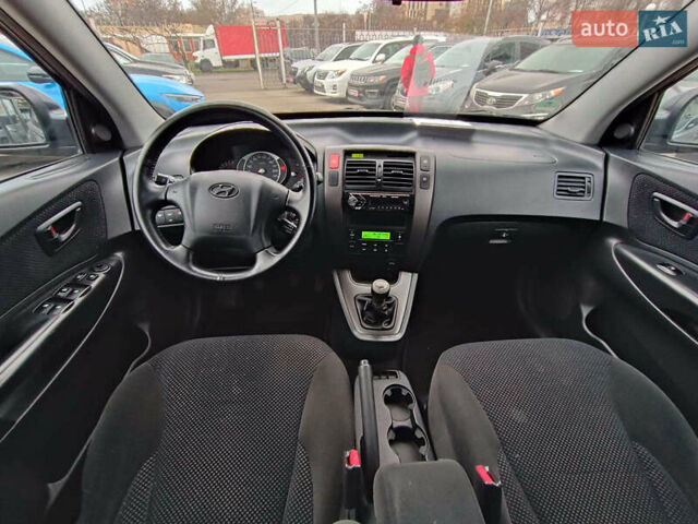 Черный Хендай Туксон, объемом двигателя 2 л и пробегом 192 тыс. км за 7990 $, фото 13 на Automoto.ua