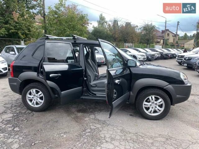 Черный Хендай Туксон, объемом двигателя 2 л и пробегом 117 тыс. км за 7990 $, фото 35 на Automoto.ua