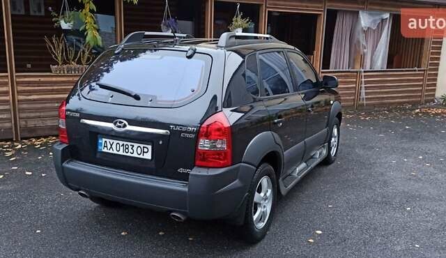 Хендай Туксон 2008 у Харкові на Automoto.ua Чорний Хендай Туксон, об'ємом двигуна 1.99 л та пробігом 188 тис. км за 8800 $, фото 19 на Automoto.ua